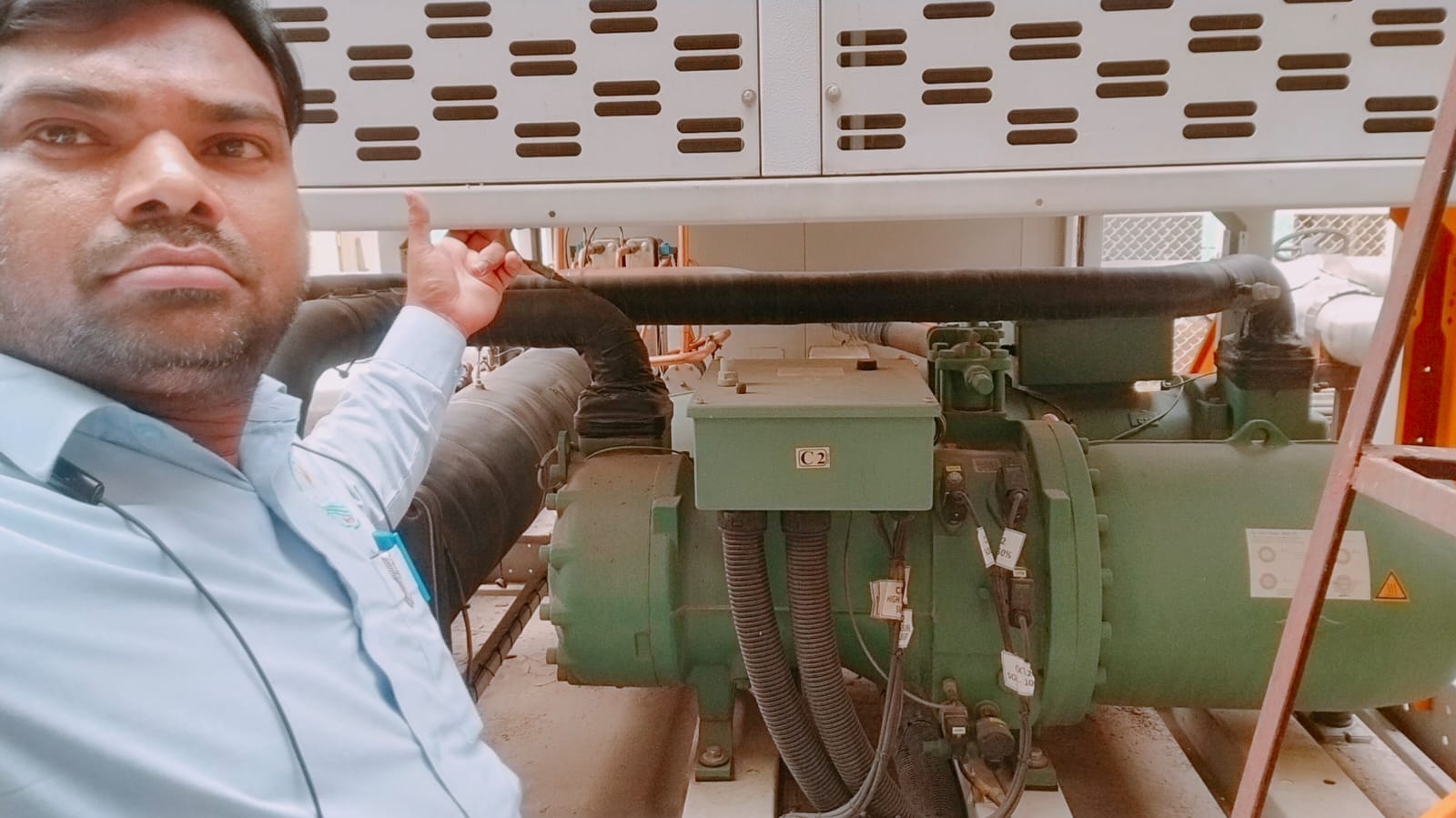 Semi-hermetic compressor C2 with insulated suction line inside the chiller package